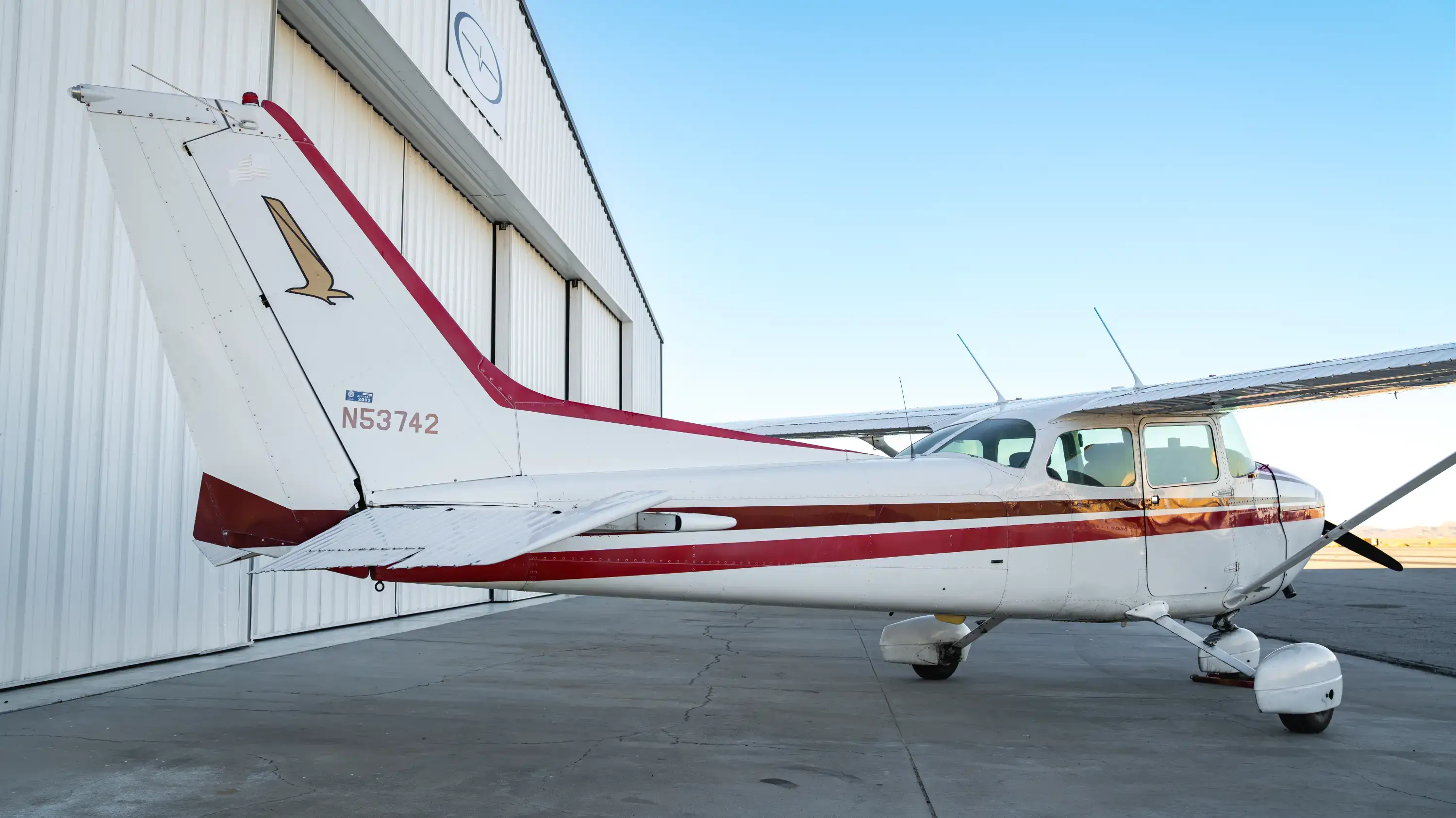 N53742 Cessna 172P back view at hangar at Lancaster California