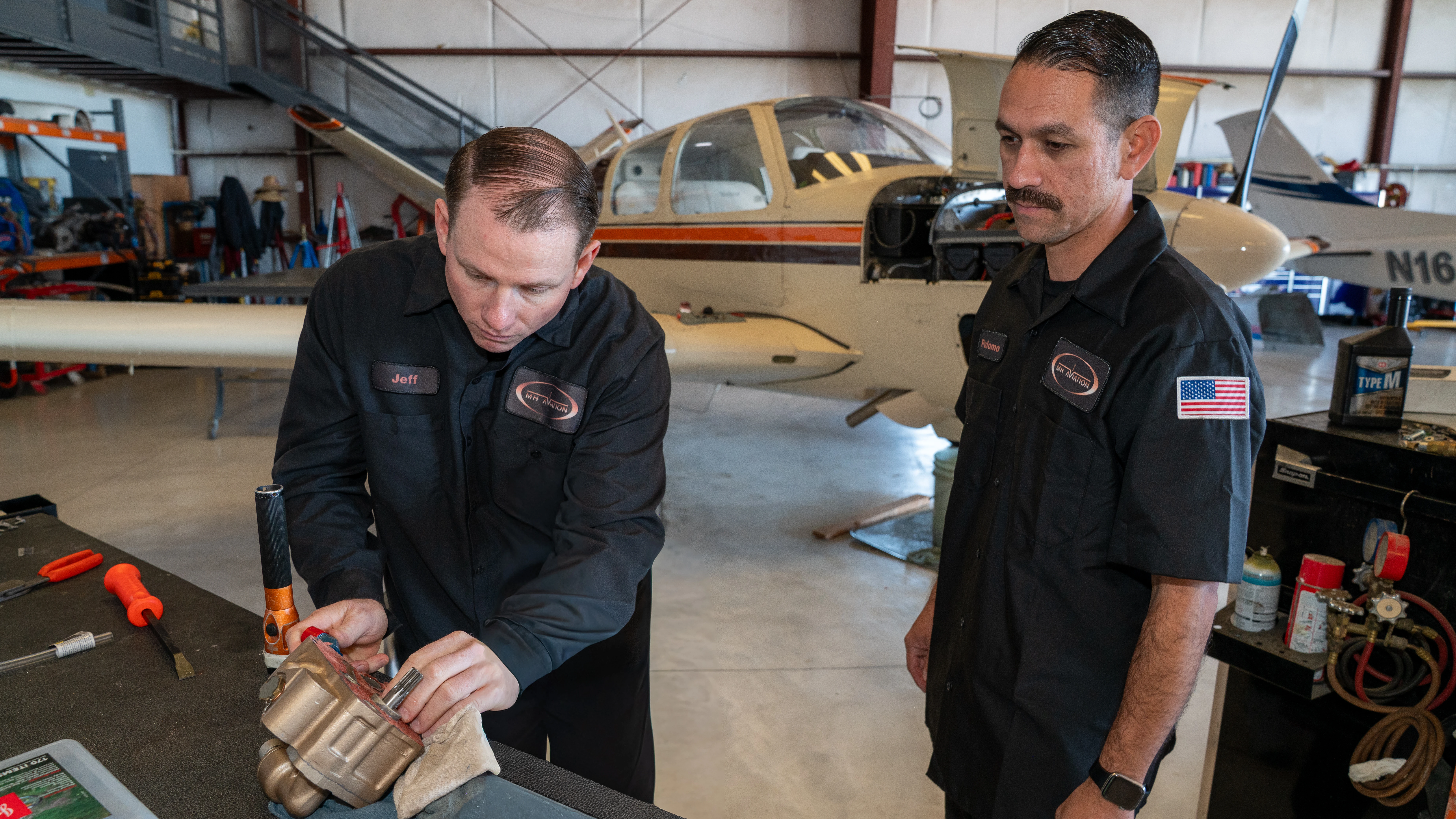 Detailed view of the precision repair workbench at MH Aviation at Lancaster, California