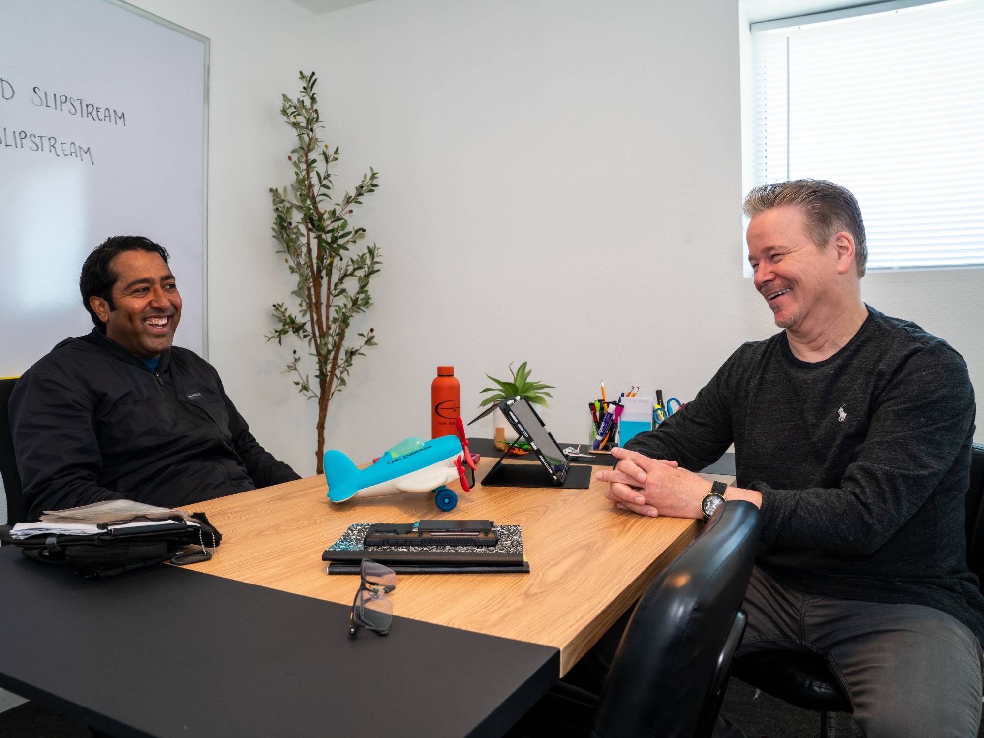 Certified Flight Instructor breaking down lesson plan with student at MH Aviation at Lancaster, CA